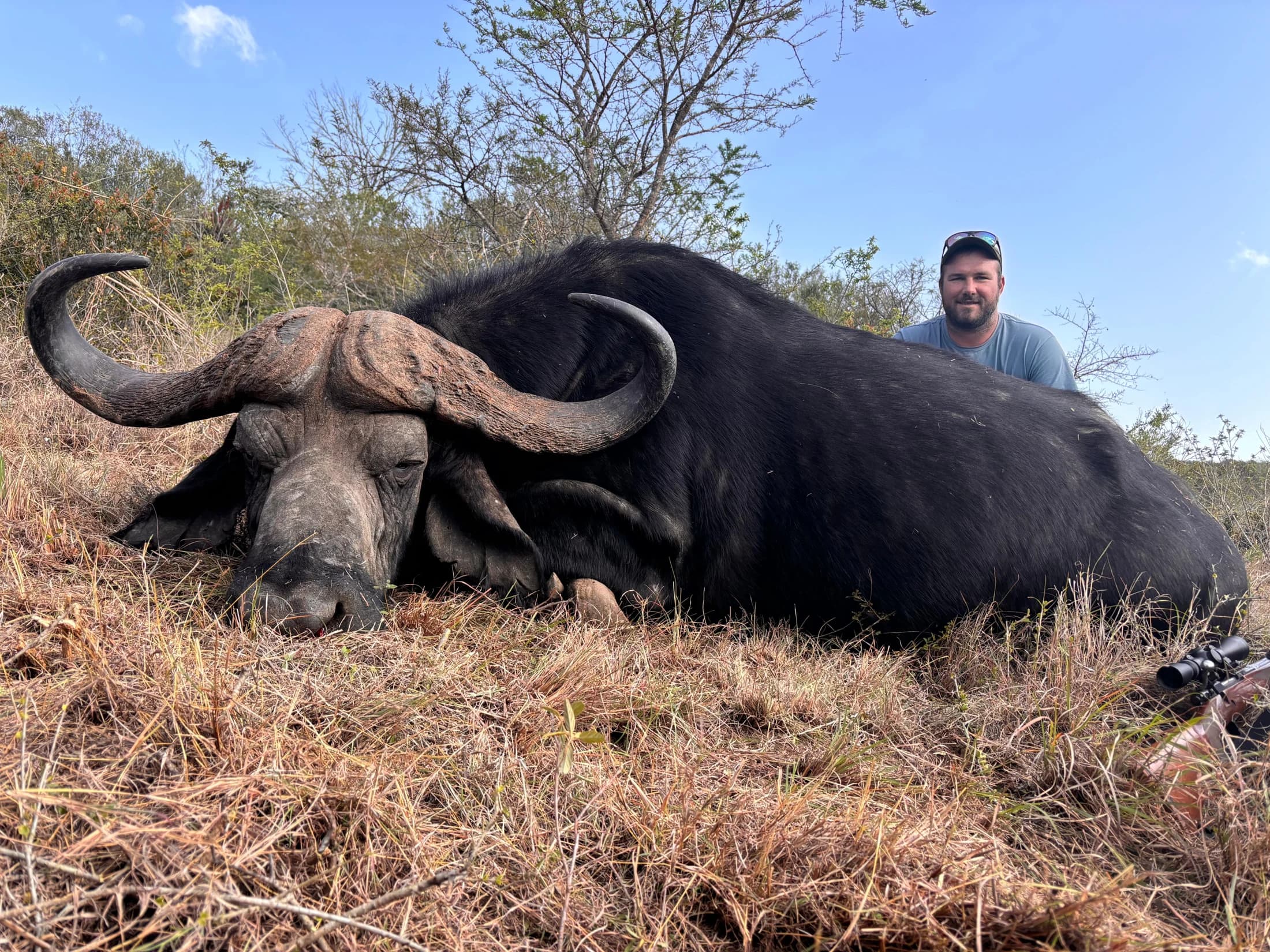 Hunter behind a harvested Cape buffalo at Garland