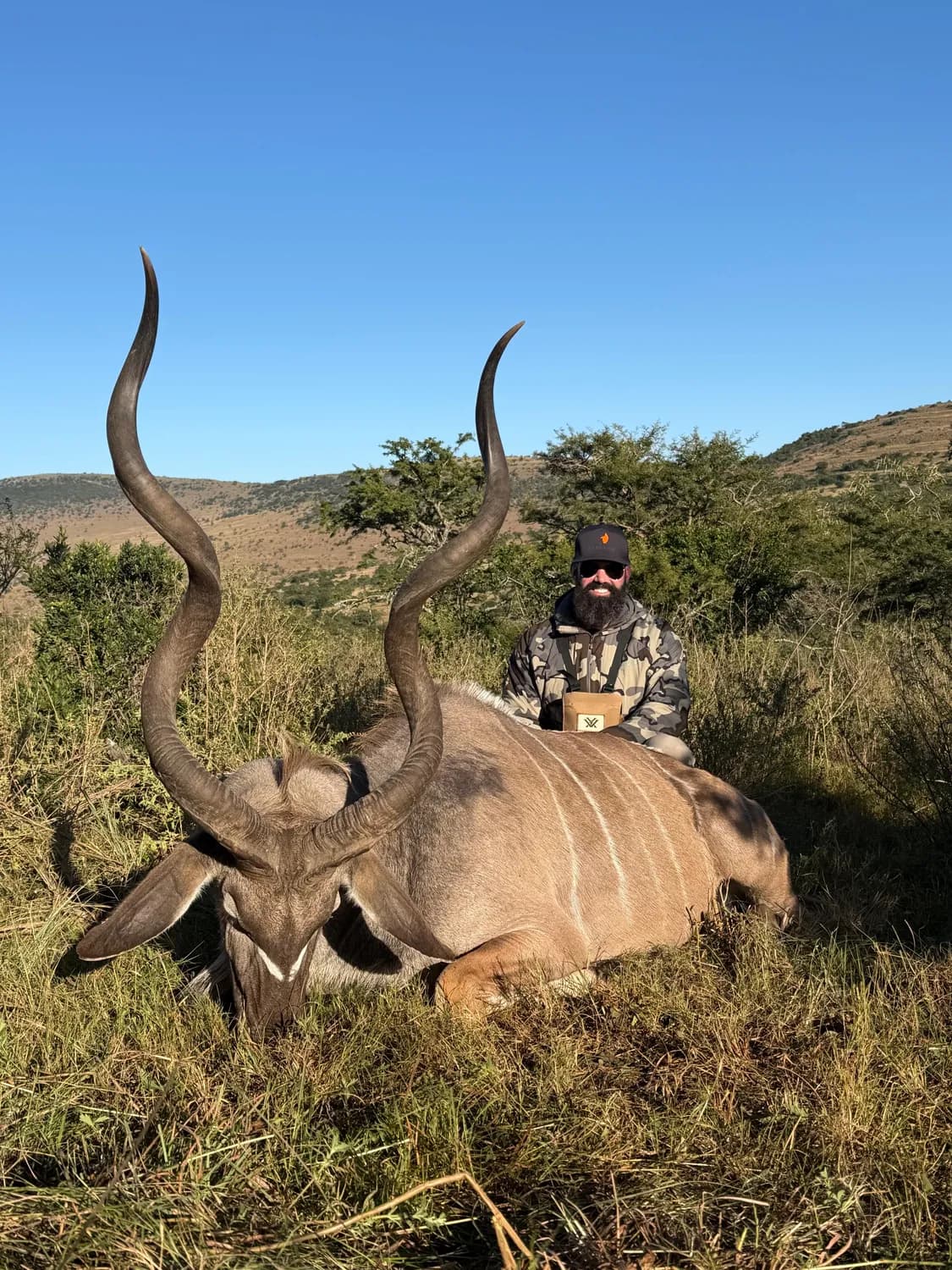 Hunter behind a harvested kudu at Garland